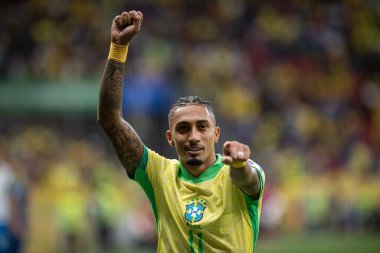 Brasilia (DF), Brazil 10/15/2024 - Raphinha celebrates his goal in the match between Brazil and Peru, valid for the 10th round of the 2026 World Cup Qualifiers at Arena BRB Mane Garrincha (ronaldo barreto / thenews2) clipart