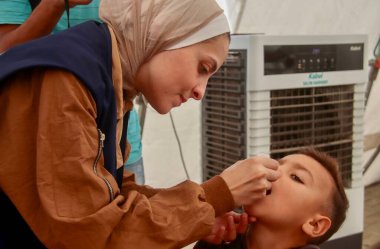 Palestinian Children Receive Second Dose of Polio Vaccine in Khan Yunis. October 19, 2024, Khan Yunis, Gaza, Palestine (niyi fote / thenews2) clipart