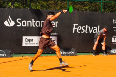 Curitiba (pr), Brazil 10/25/2024- portuguese duel for the quarterfinals of the atp challenger curitiba, tennis player jaime faria beat his compatriot gastao elias by 5/7 6/3 6/1 (edson de souza / thenews2) clipart