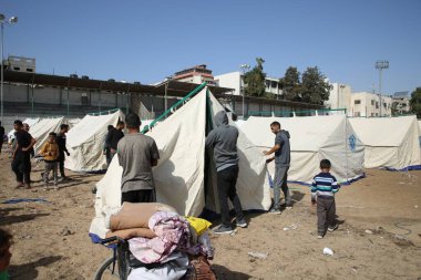 (int) Filistin uluslararası stadyumu yerlerinden edilen insanlar için sığınağa dönüştürüldü. 10 Kasım 2024, Gazze, Filistin: Gazze şehrinin merkezindeki Filistin uluslararası stadyumu bir sığınağa dönüşüyor (Hashem zimmo / thenews2)