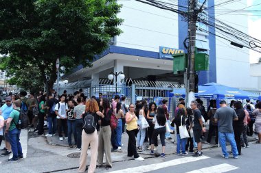 Sao paulo (sp), 11/17/2024 - education / entrance exam/fuvest/sp. - students arrive to take the first phase of fuvest 2025, the largest entrance exam in the country competing for places at usp. (Leandro Chemalle/Thenews2) clipart