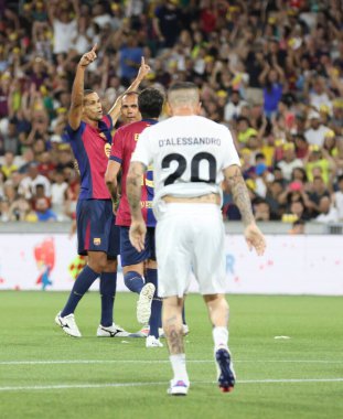 Curitiba (Pr), 11 / 17 / 2024 - Hospital pequeno Principe / legends Pele / Barcelona- rakip oyuncu, pequeno Principe ve Barca efsaneleri arasındaki maçı bir hayır maçında kutluyor (Edson De Souza / Thenews2))