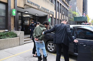 Manhattan, new york, usa: November 20, 2024 - 25-year-old brandon simosa who is homeless was arrested and walked out of the midtown precinct south after a robbery and lewd sex act in manhattan, new york. (kyle mazza/thenews2) clipart