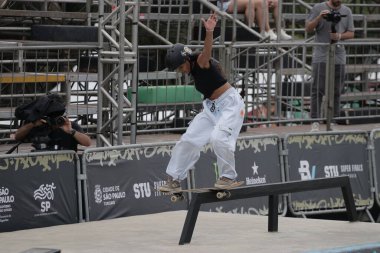 Sao paulo, Brazil: 11.23.2024 - skater during the semi-final of the women's street skate of the stu in sao paulo on the morning of this saturday (23) at the stu skatepark, inside the villa lobos park. (Fabricio Bomjardim/Thenews2) clipart