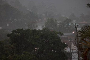 Cotia (sp), Brazil 11/28/2024 - overcast skies and heavy rain in the granja vianna neighborhood in the city of cotia this thursday afternoon, november 28, 2024 (Leco Viana / Thenews2)  clipart