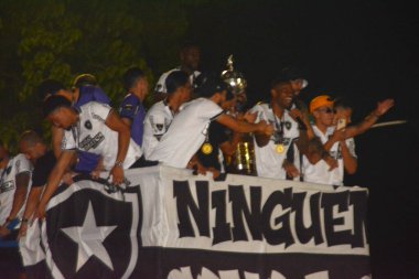 Rio de janeiro (rj), Brazil 12/01/2024 - crowd celebrating botafogo's libertadores title, the motorcade leaves with the mourisco do mar players along av. Das Nacoes Unidas towards nicaragua square in botafogo clipart