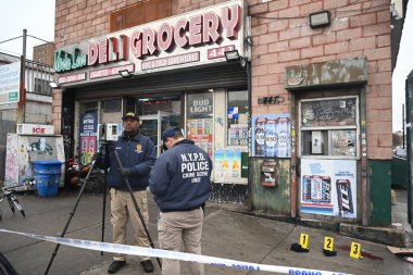 new york city police department crime scene investigators at the scene of a 34-year-old man being stabbed multiple times to death at mucho luco deli grocery in brownsville, brooklyn, new york. Tuesday, december 17, 2024 (kyle mazza / thenews2) clipart