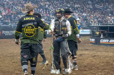 January 05, 2025, new york, new york, usa: koltin hevalow rides sonny b during third round of the professional bull riders 2025 unleash the beast event at madison square garden (m10s / thenews2) clipart