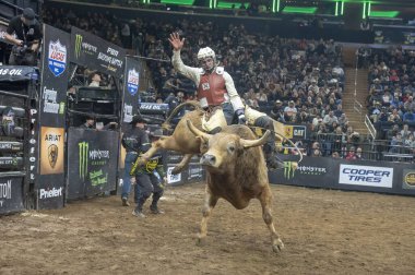 January 05, 2025, new york, new york, usa: hudson bolton rides big red during third round of the professional bull riders 2025 unleash the beast event at madison square garden (m10s / thenews2) clipart