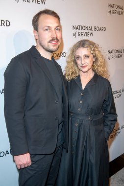 January 07, 2025, new york, new york, usa: (l-r) gints zilbalodis and carol kane attend the national board of review annual awards gala at cipriani 42nd street on january 07, 2025 in new york city (m10s / thenews2)  clipart