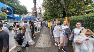 Sao Paulo, Brezilya 01 / 26 / 2025 - binlerce taraftar 21 pilot gösterisi için Allianz Parque 'ın kapısında kuyruğa girdi. Hat, 26. Pazar günü öğleden sonra West Plaza alışveriş merkezi ve Agua Branca parkını geçerek uzanır (Leandro chemalle / the new ws2)