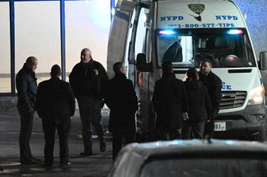 New York, USA: January 28, 2025 - nypd crime scene unit investigators at the scene where one teenage boy was shot and killed and another was injured in a shooting in the East Flatbush neighborhood of Brooklyn, New York. (Kyle Mazza/Thenews2) clipart