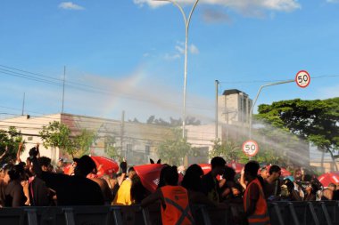 Brazil, Sao paulo, 01/31/2025 - carnival/blocks - archive: firefighters throw water to cool down revelers at the street carnival on 02/13/2024 - the carnival blocks of sao paulo delivered a letter to mayor ricardo nunes. (Leandro Chemalle/Thenews2) clipart