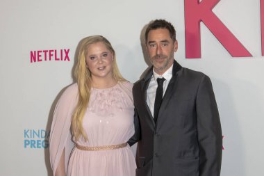 February 03, 2025, new york, new york, usa: (l-r) amy schumer and chris fischer attend netflix's 