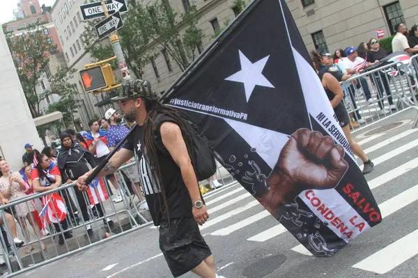 New York, ABD: 8 Haziran 2025 - New York 'taki 2025 Ulusal Porto Riko Günü, Filistin lehine protestolarla, savaşın sona ermesi ve libe için mücadele edilmesi talebiyle 8 Haziran Pazar günü düzenlendi. (Niyi Fote/Thenews2)