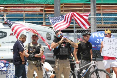 14 Haziran 2025, Miami, Florida, ABD: Miami 'deki Bisscayne Bulvarı' nda birçok anti-koz protestocusu bize karşı protesto gösterisi düzenledi, Donald Trump 'ın göçmenlik politikaları, otoriterciliği (niyi fote / the enews2)