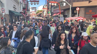 Sao Paulo (SP), Brezilya 07 / 13 / 2025 - Sao Paulo şehrinin merkezi bölgesi olan Liberdade Mahallesi 'nde turist hareketi, bu Pazar, 13 Temmuz 2025. (Oslaim Brito / the newws2)