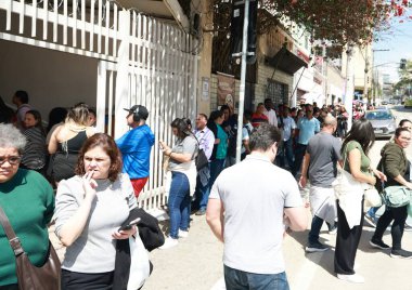 Sao Paulo (SP), Brezilya 09 / 01 / 2025: Sendika katkı belgesinin hazırlanması için Liberdade Mahallesi 'ndeki Tamandare ve Otavio Gomes sokakları arasında kuyruk oluştu (leco viana / theenews2)