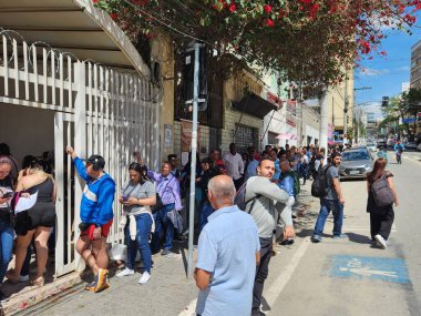 Sao Paulo (SP), Brezilya 09 / 01 / 2025: Sendika katkı belgesinin hazırlanması için Liberdade Mahallesi 'ndeki Tamandare ve Otavio Gomes sokakları arasında kuyruk oluştu (leco viana / theenews2)