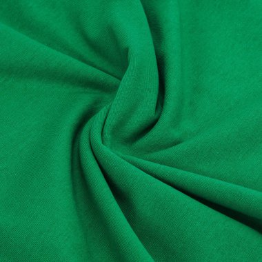 Yumuşak kıvrımlarla örülmüş yeşil kumaş. Bu kaliteli görüntü moda tasarımcıları, tekstil sanatçıları ve örgü tasarımcılarıyla çalışmak için mükemmel.