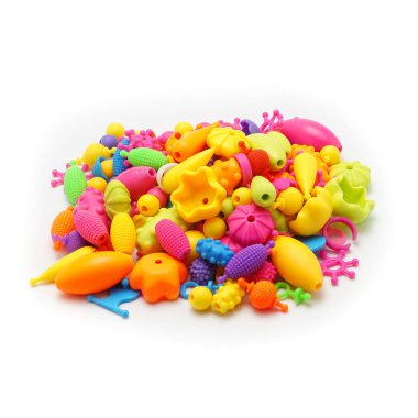 A set of bright and colorful toy rings designed for kids creative play. These playful accessories can be combined to form various shapes, enhancing imagination and motor skills. Picture on a white