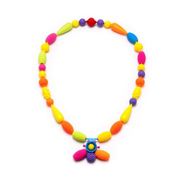 Colorful set of childrens toys, beads, decorations isolated on white background.
