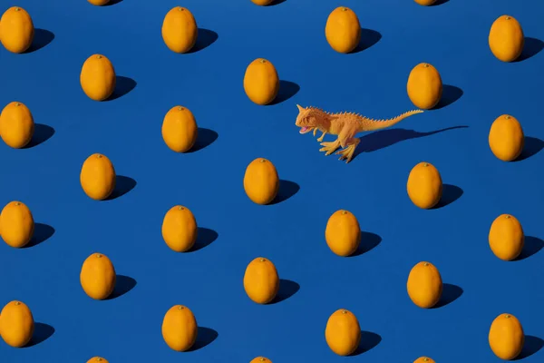Orange Ägg Med Dinosaurie Blå Bakgrund Mönster — Stockfoto