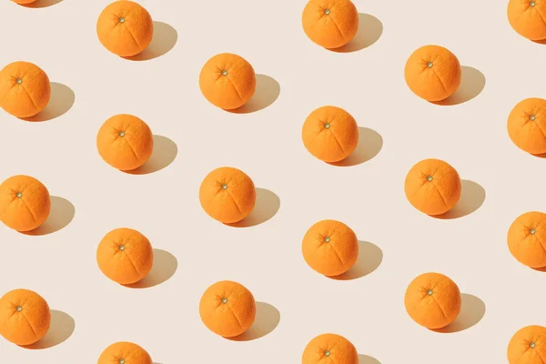 Arranged orange on a white background. Pattern.