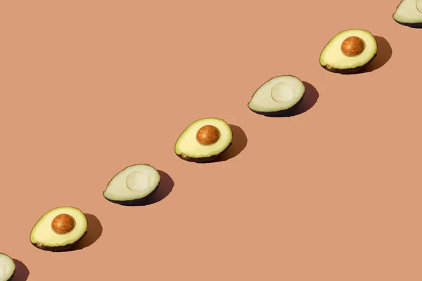 Geregeld Avocado Een Bruine Crème Achtergrond Patroon — Stockfoto