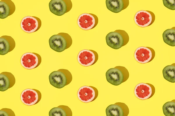Arranged Kiwi Grapefruit Minimal Yellow Background — Stock Photo, Image
