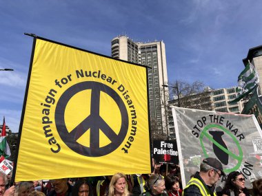 London, England, UK - March 9 2024: CNC Campaign nuclear Disarmament of peaceful anti- war coalition protest demonstration crowds for ceasefire in Gaza Middle East march from Hyde Park to US embassy  clipart