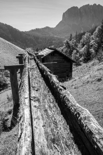 stock image An old wooden inlet channel of a watermill in Val di Morins, the Dolomite Alps of South Tirol