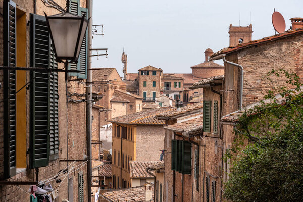 Somewhere in the streets of the old medieval Siena, Italy