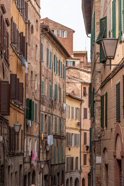 Somewhere in the streets of the old medieval Siena, Italy