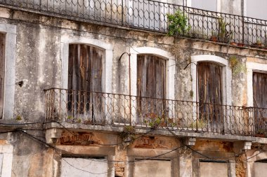 An old ruined house in the center of Lisbon near castle of Saint Jorge, Portugal clipart