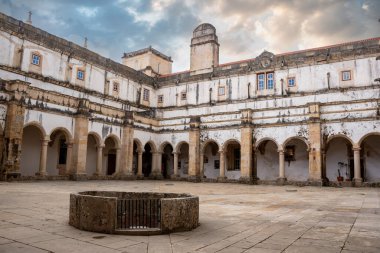 Tomar, Portugal - June 02, 2024 - Medieval Claustro da Micha in the former templar orders Convent of Christ in Tomar, Portugal clipart