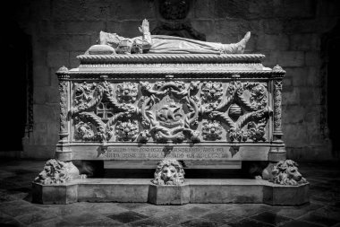 Lisboa, Portugal - June 03, 2024 - Rich ornate gothic tomb of famous discoverer Vasco da Gama in the church of the Jeronimos monastery in Lisboa, Portugal clipart