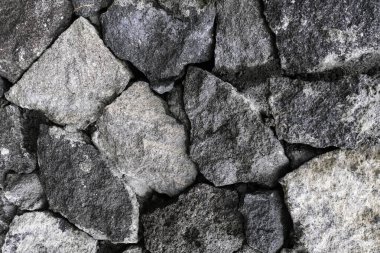 İnşaat alanı arkaplan dokusundaki gri kayaların farklı tonlarını kapat