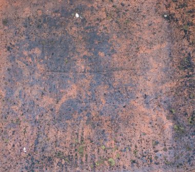 Rusted copper metal with black stains background texture