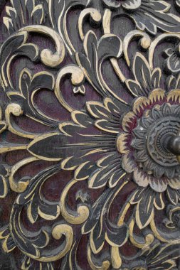 Balinese dark brown carved door with antique brass door knob ring