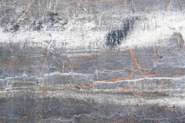 Gri ve mavi renkte renkleri olan beton duvar. Dalgalanma dokusu gibi.