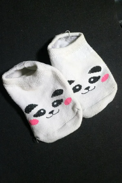 Fotografie Roztomilé Dětské Ponožky Panda Obličeje — Stock fotografie