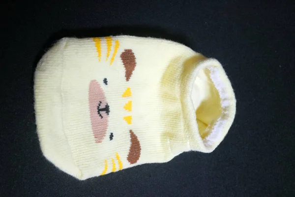 Uma Foto Meias Bebê Bonito Amarelo Com Rosto Hamster Sobre — Fotografia de Stock
