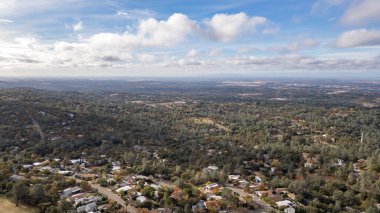 Drone photos over beautiful landscape in Oroville, California with clouds, rivers, roads and more