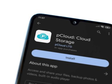Lod, Israel - July 16,2023: pCloud app play store page on smartphone on white background. Top view flat lay with copy space.