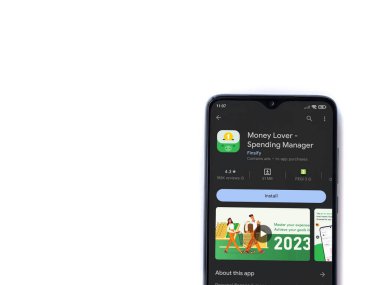 Lod, Israel - July 16,2023: Money Lover app play store page on smartphone on white background. Top view flat lay with copy space.