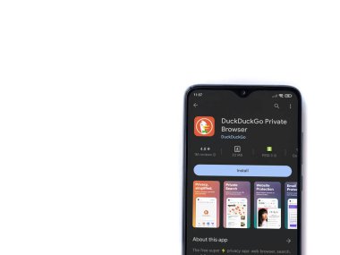 Lod, Israel - July 16,2023: DuckDuckGo Private Browser app play store page on smartphone on white background. Top view flat lay with copy space.