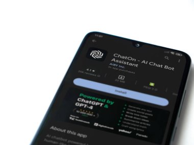 Lod, Israel - July 16,2023: ChatOn app play store page on smartphone on white background. Top view flat lay with copy space.