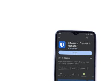 Lod, Israel - July 16,2023: Bitwarden Password Manager app play store page on smartphone on white background. Top view flat lay with copy space.