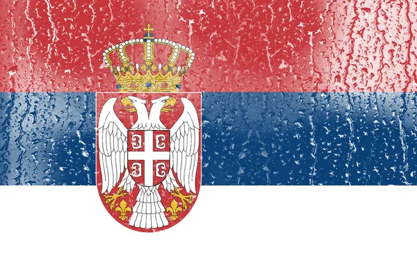 水滴背景玻璃上的塞尔维亚3D国旗 — 图库照片